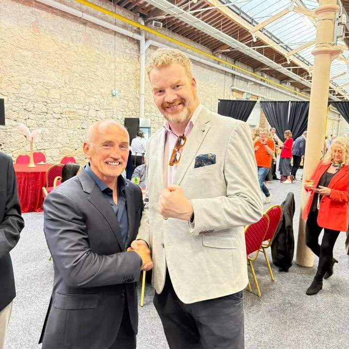 Martin Murtagh with boxing legend Barry McGuigan at a business event